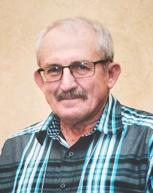 Jim E Plocher obituary photo